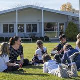 King School Photo - Grade 4 students discussing the world around them in science class.